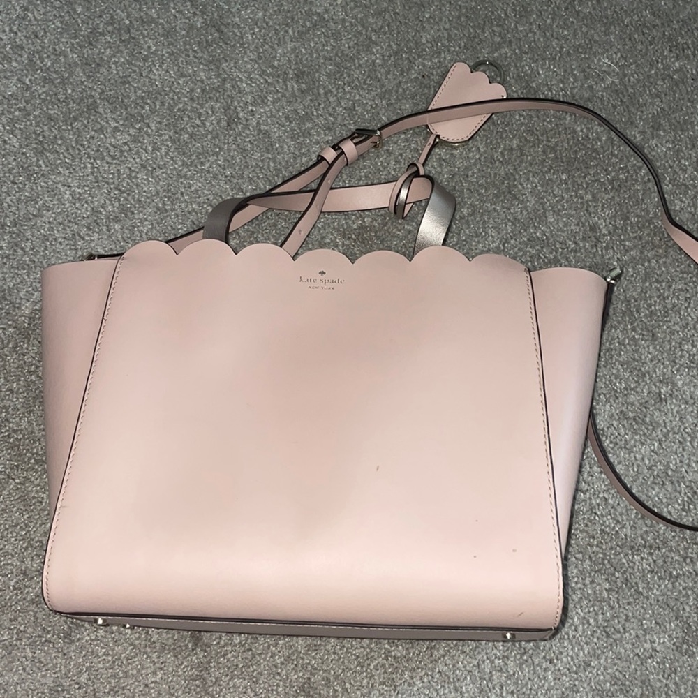 Medium Kate Spade tote. Fits laptop. Handle and additional strap included.